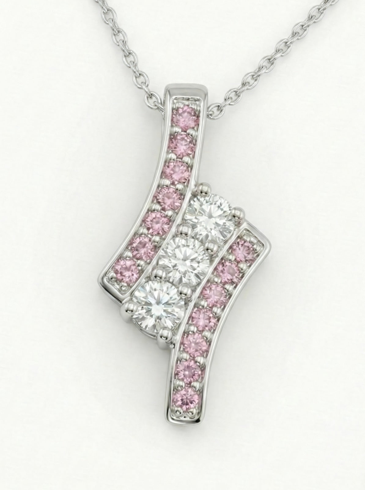 Collar Sendero Rosé de Sejem Joyas. Diseño vertical en plata 925 con zirconias blancas centrales y laterales rosas sobre fondo blanco.